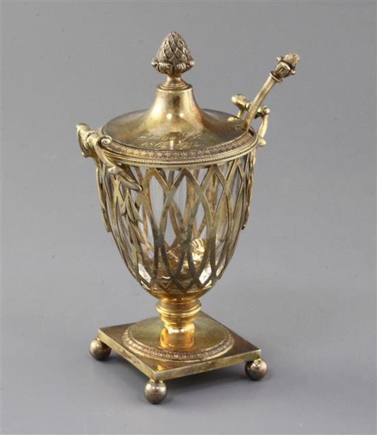A George V silver gilt two handled sugar vase and matching sifter spoon, by Mappin & Webb, 10 oz.